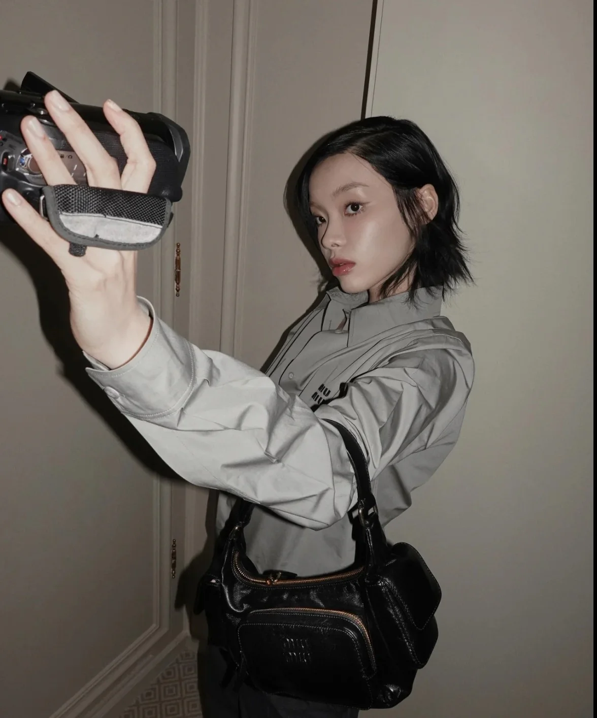 Сумка-клатч Miu Miu из кожи наппа — черная