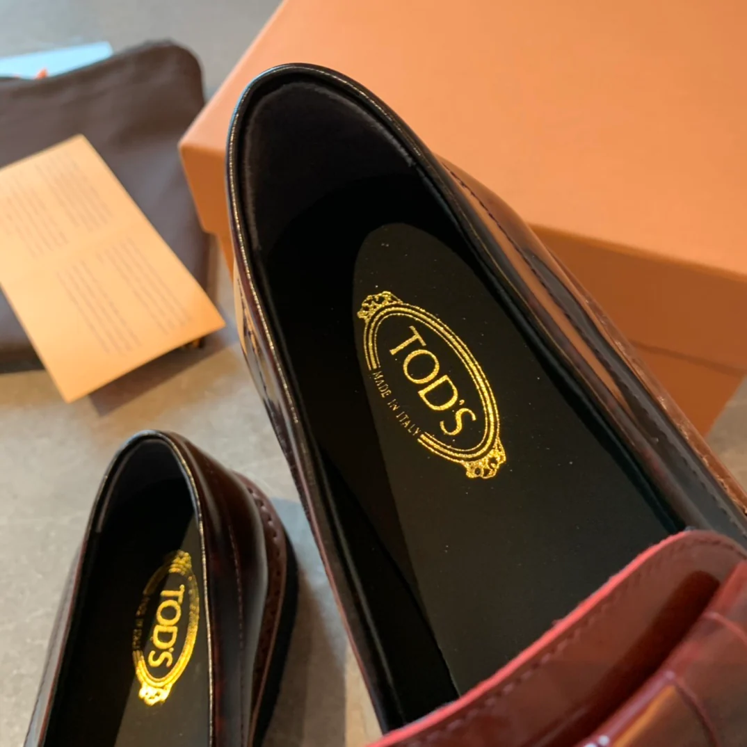 Лоферы Tods на платформе с кисточками - 1