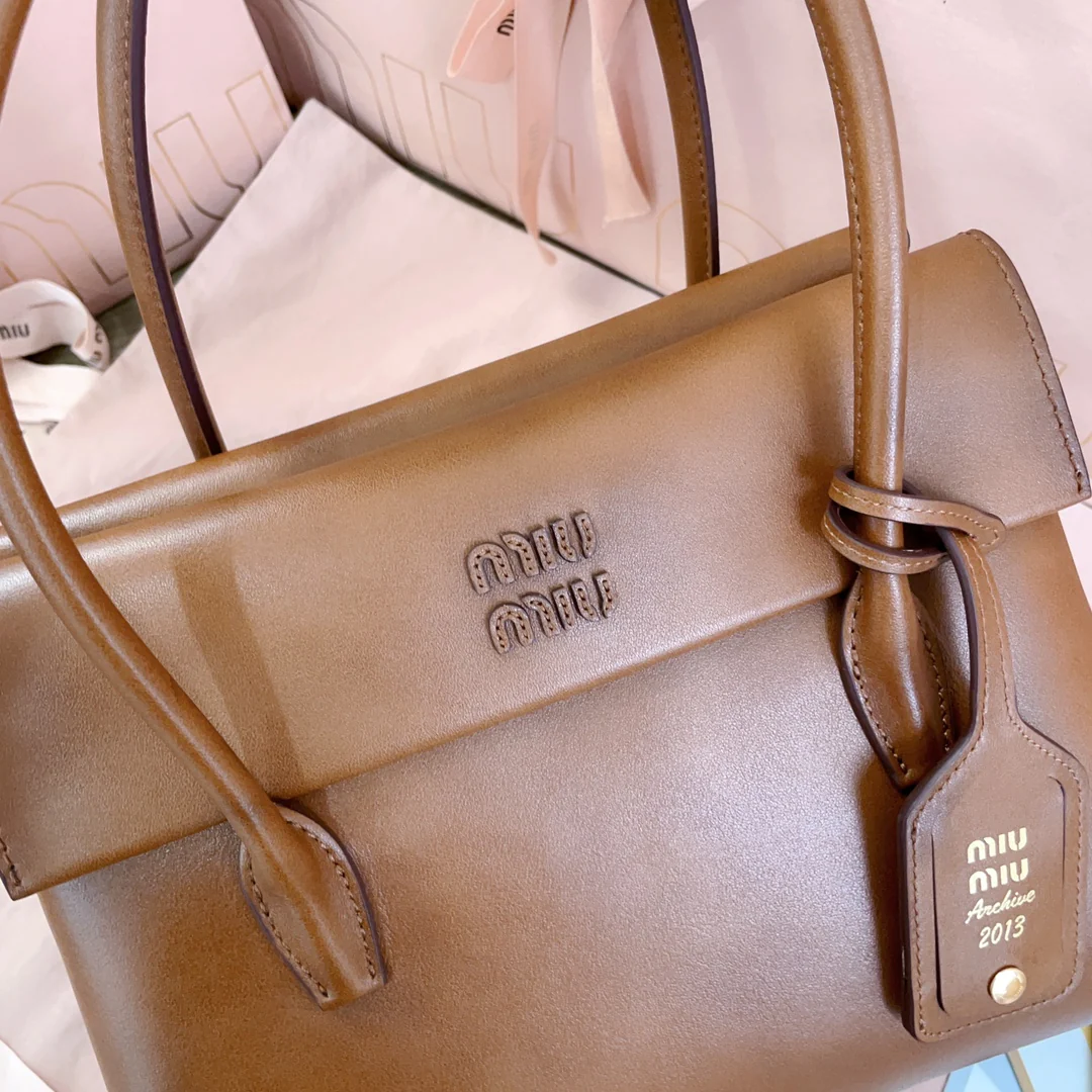 Сумка Miu Miu-5ba302-mimisolitaire из телячьей кожи