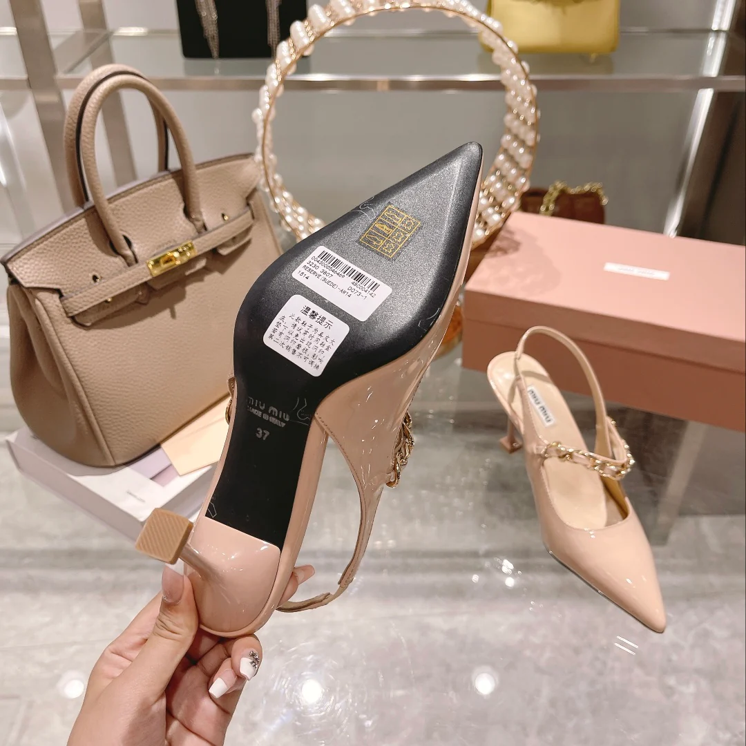 Новинка осенне-зимней коллекции Miu Miu 2022 — Туфли на каблуке с острым носком и разрезом — Розовые — 1