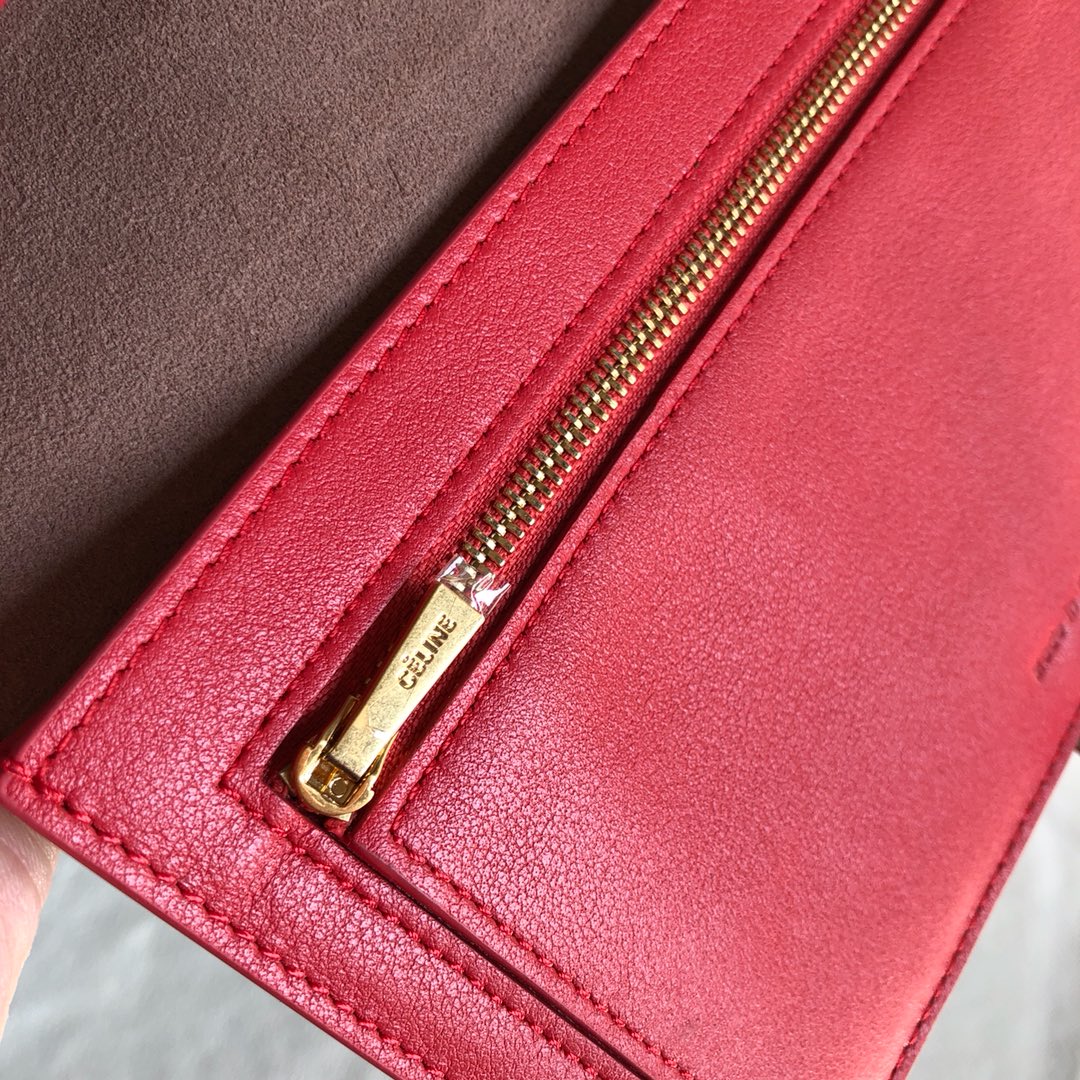 Длинный кошелек Celine — абрикосовый и фуксия — с принтом пальм.