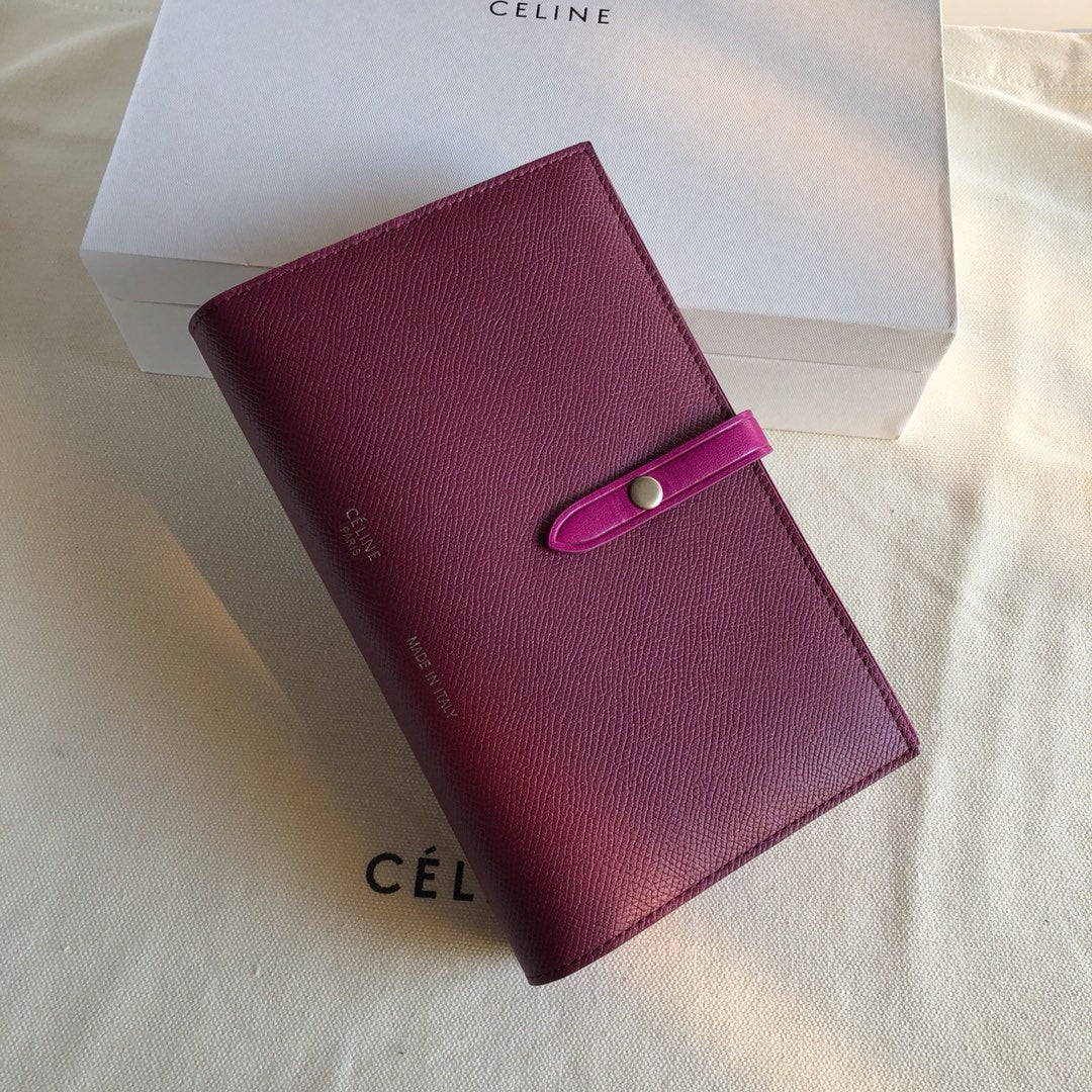 Длинный кошелек Celine - бордовый и фиолетовый - с принтом в виде пальм.