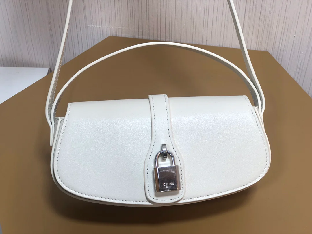 Мини-клатч Celine Tabou с плечевым ремешком в форме замка — белый — из гладкой коровьей кожи.