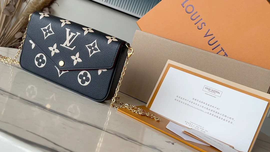 m64064-LV-pochette-felicie-empreinte сумка через плечо с тиснением - черная сетчатая версия