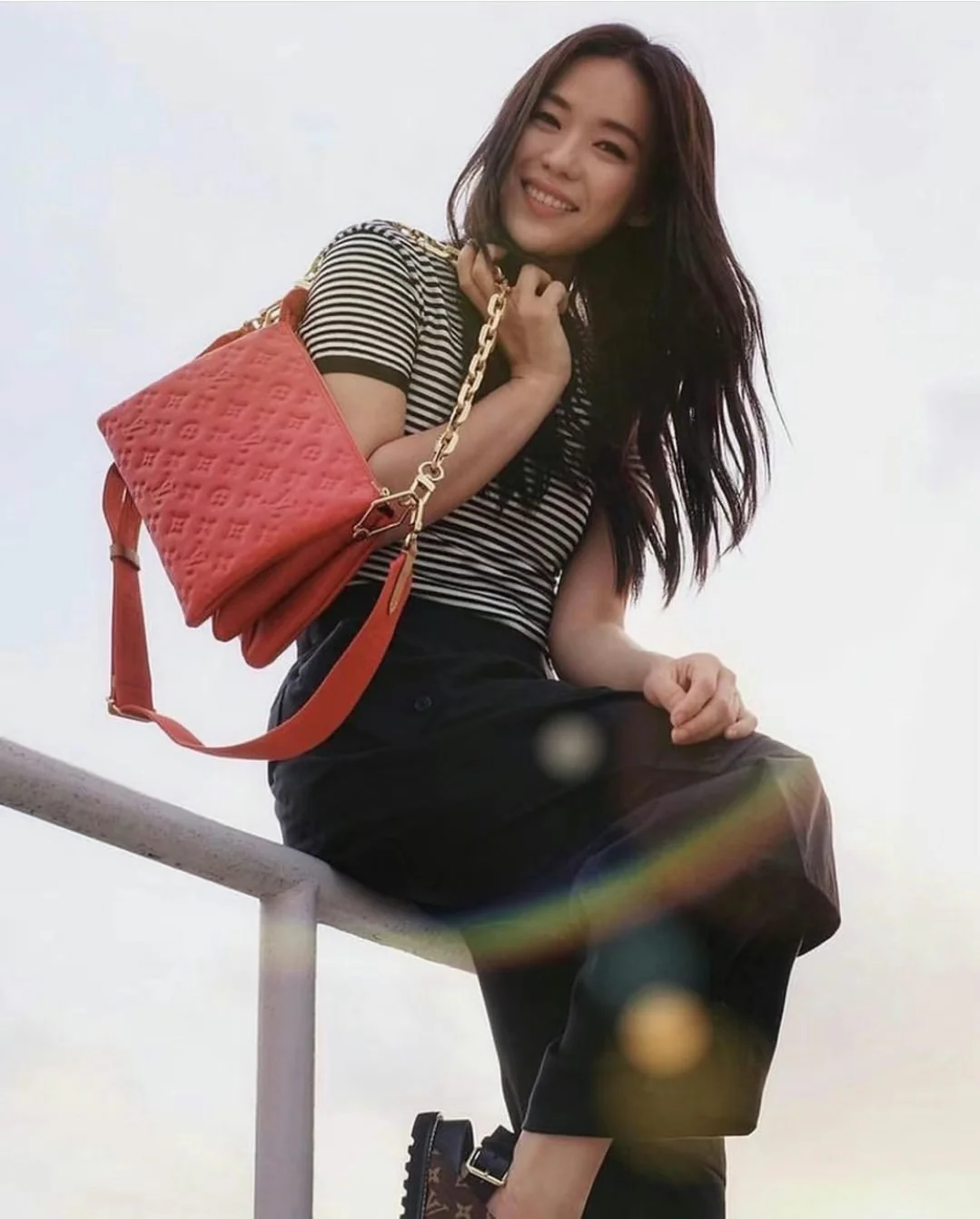 m57792-LV-coussin handbag-small-red-on-body photo