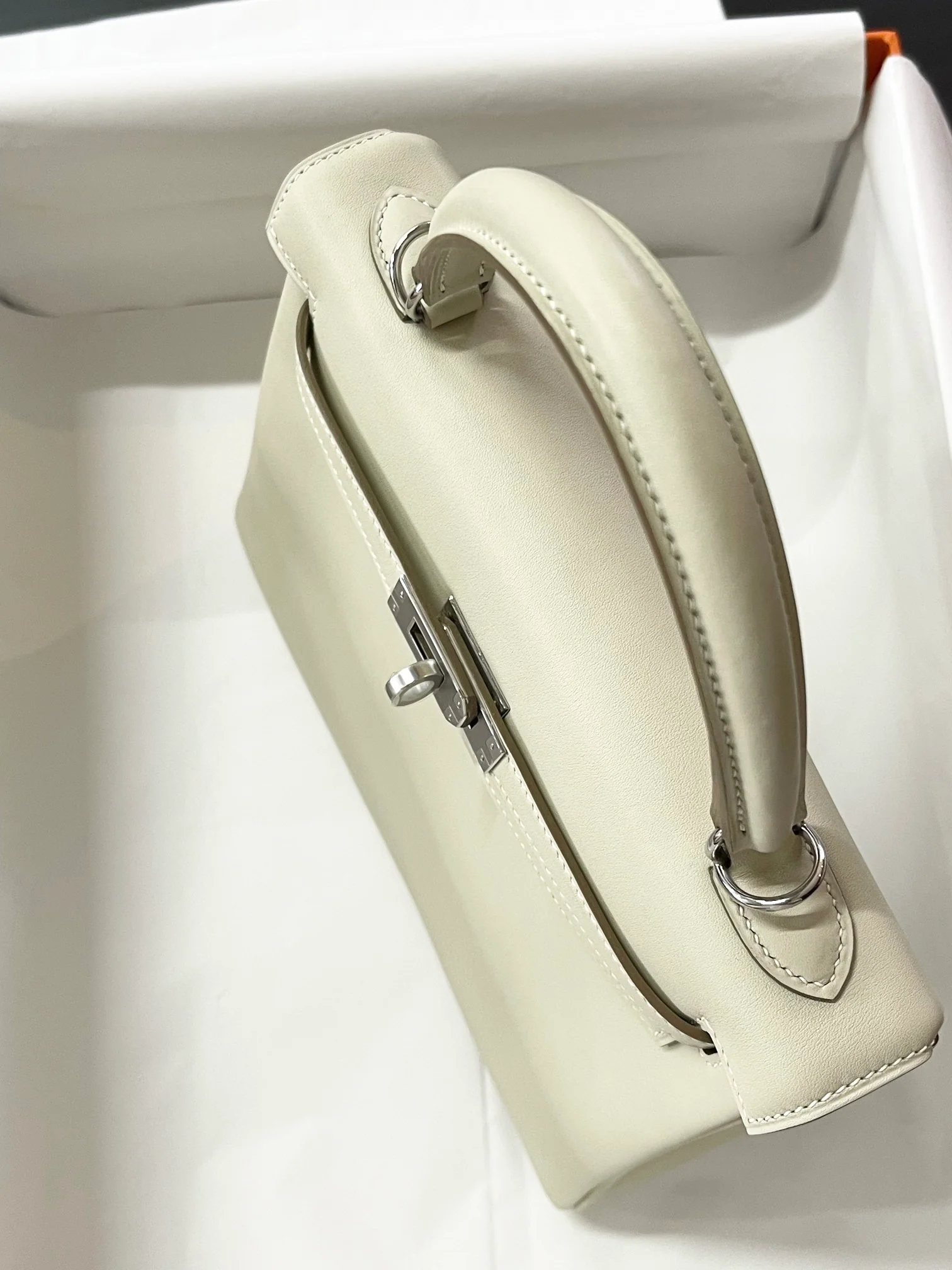 Hermes Kelly 25 Swift Milkshake White Silver Buckle