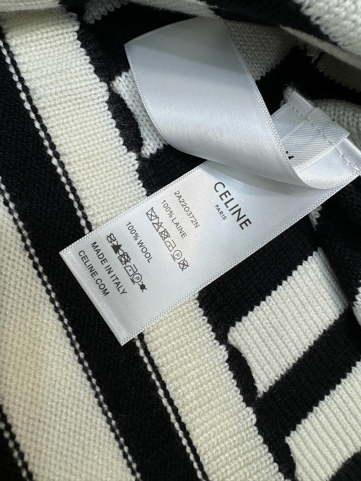 Вязаный жилет Celine-2404 с кружевной отделкой и полосатым рисунком в стиле колор-блок.