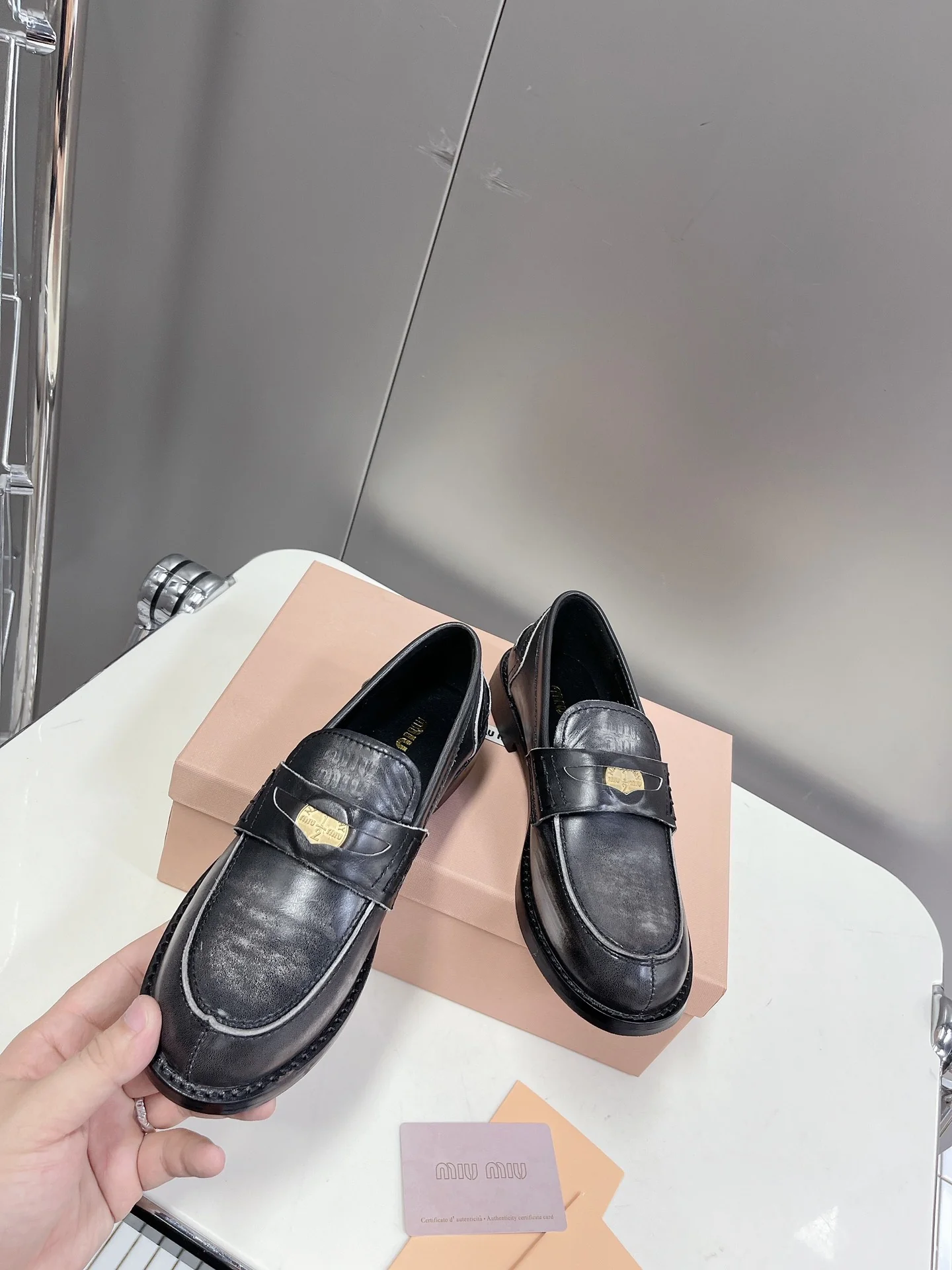 Лоферы Miu Miu Coin - черные