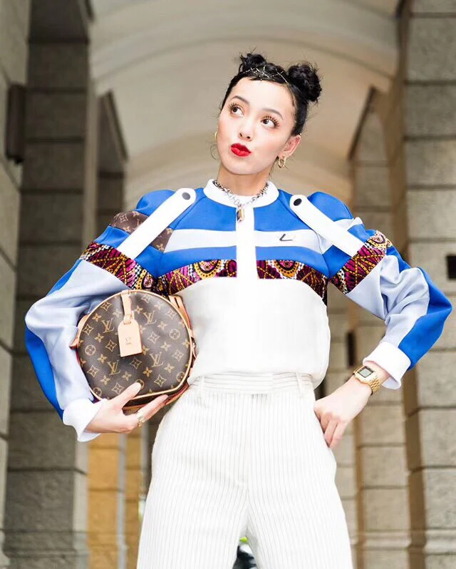 Круглая сумка LV