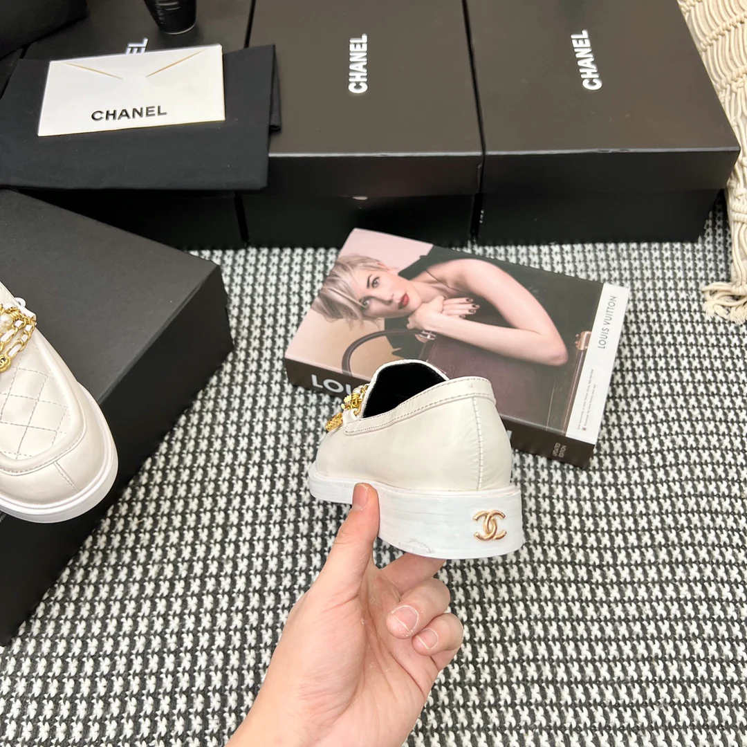 Туфли-балетки Chanel в афро-стиле