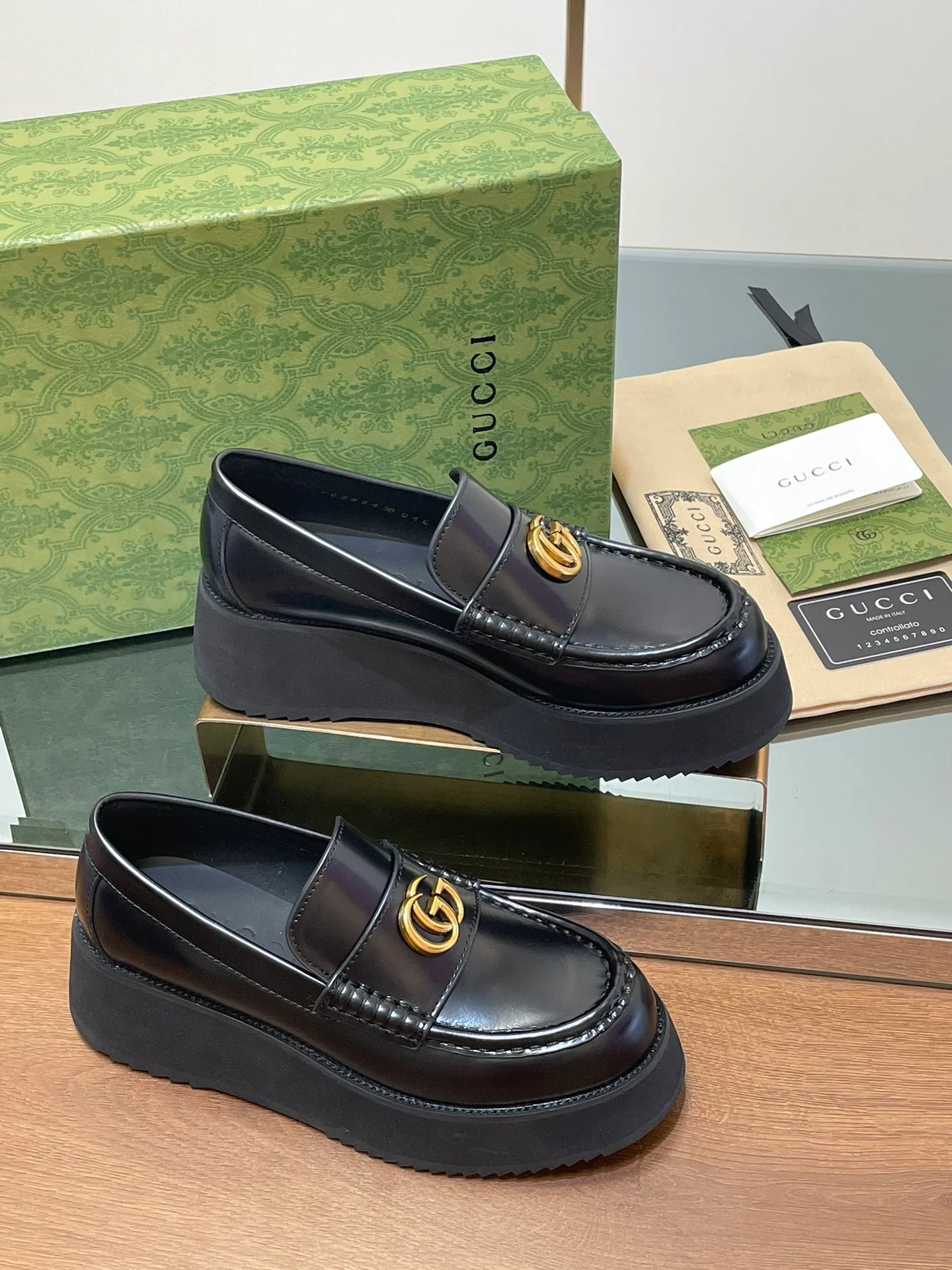 Лоферы на платформе Gucci 2024 - черные