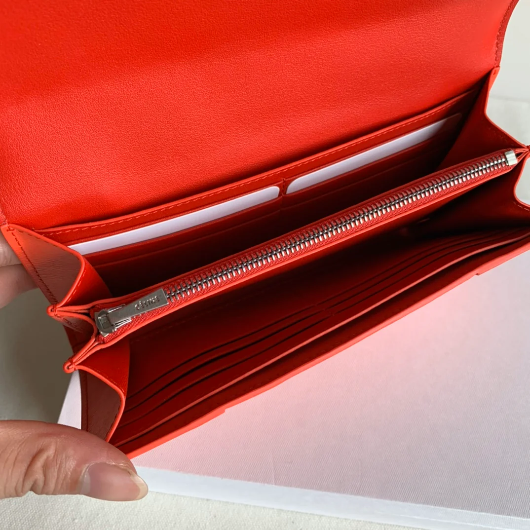 Кошелек-книжка Celine - узор ?водная рябь? оранжево-красного цвета