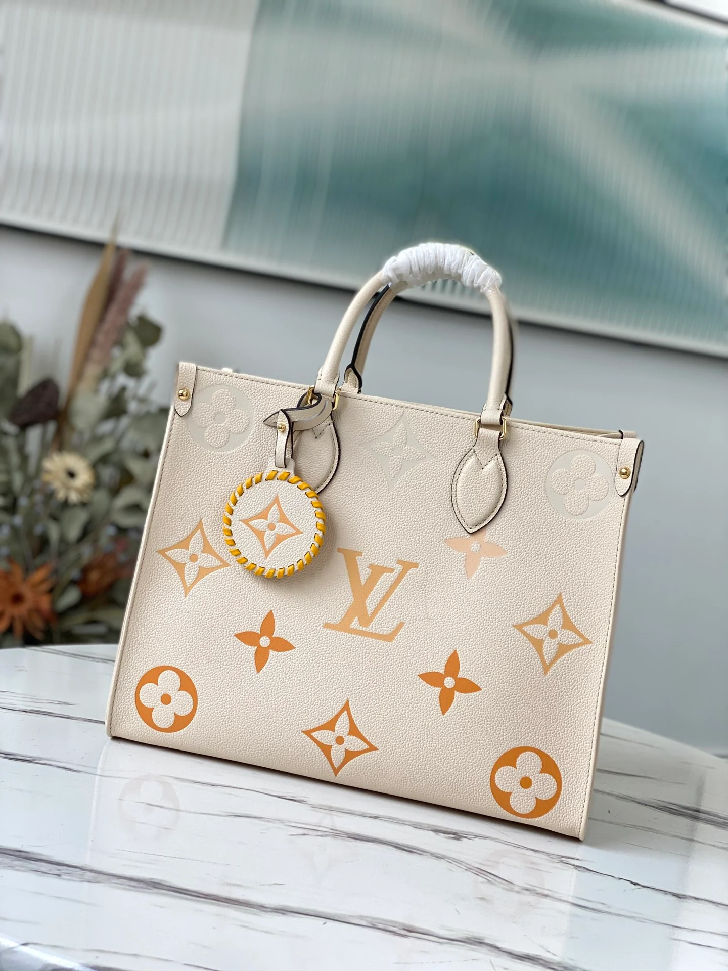 lv-m45717-vanilla yellow-by-the-pool-capsule series-onthego-mm medium-sized-tote bag