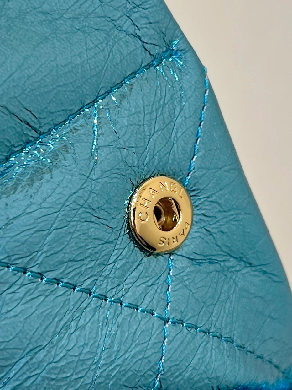 Миниатюрная металлическая кожаная мусорная сумка Chanel 25c - синяя