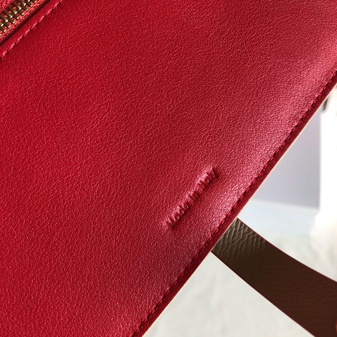 Длинный кошелек Celine — абрикосовый и фуксия — с принтом пальм.