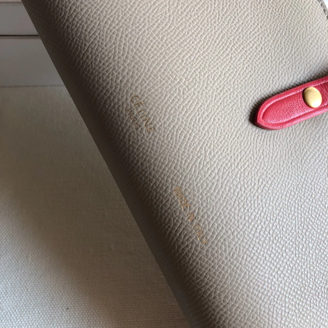 Длинный кошелек Celine — абрикосовый и фуксия — с принтом пальм.