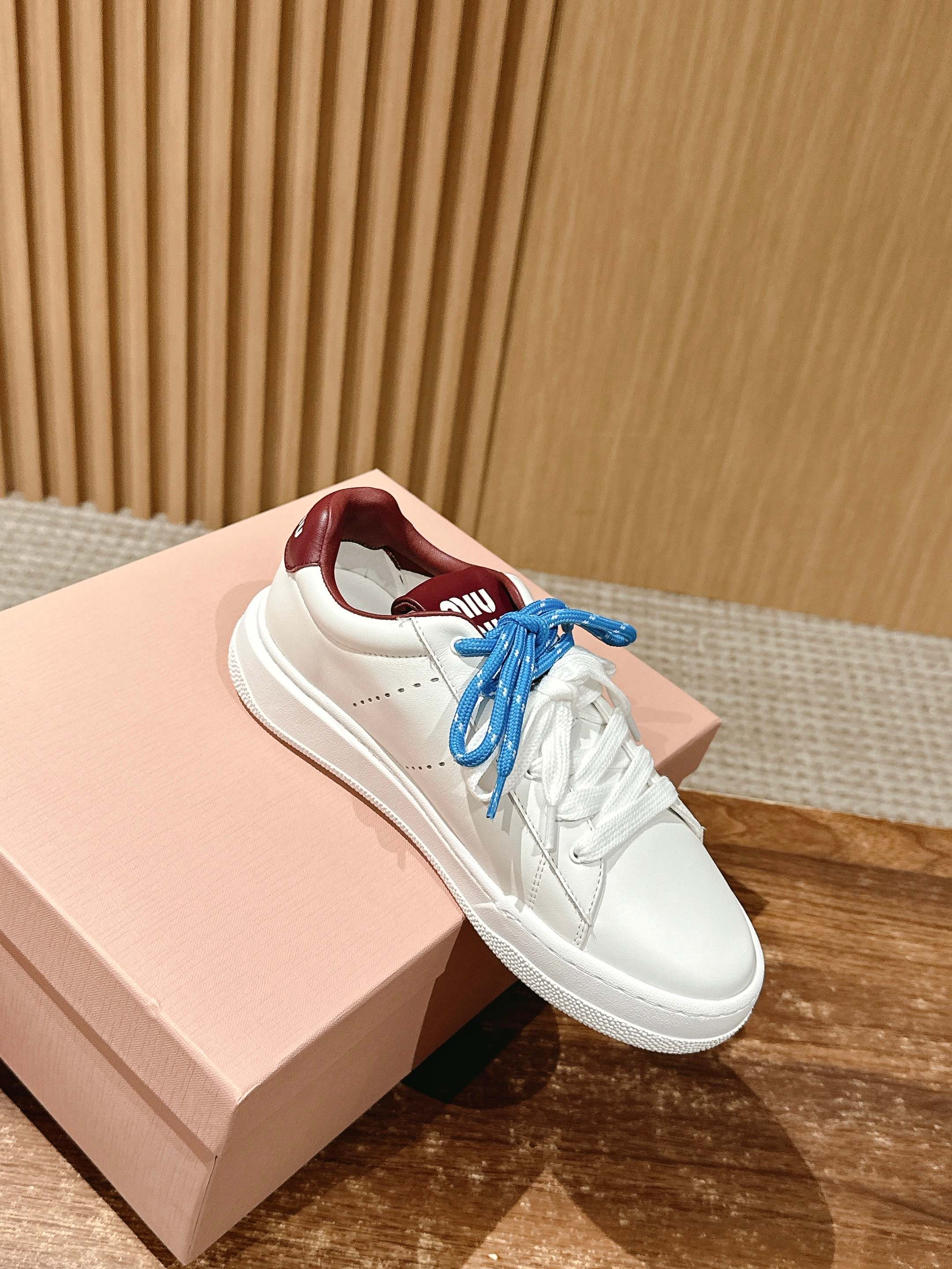 Повседневные кроссовки Miu Miu на шнуровке - синие