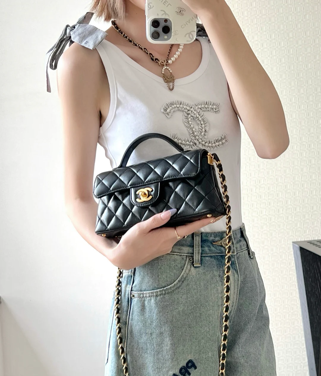 Мини-юбка Chanel Kelly из шерсти, черная, 25 пенсов.