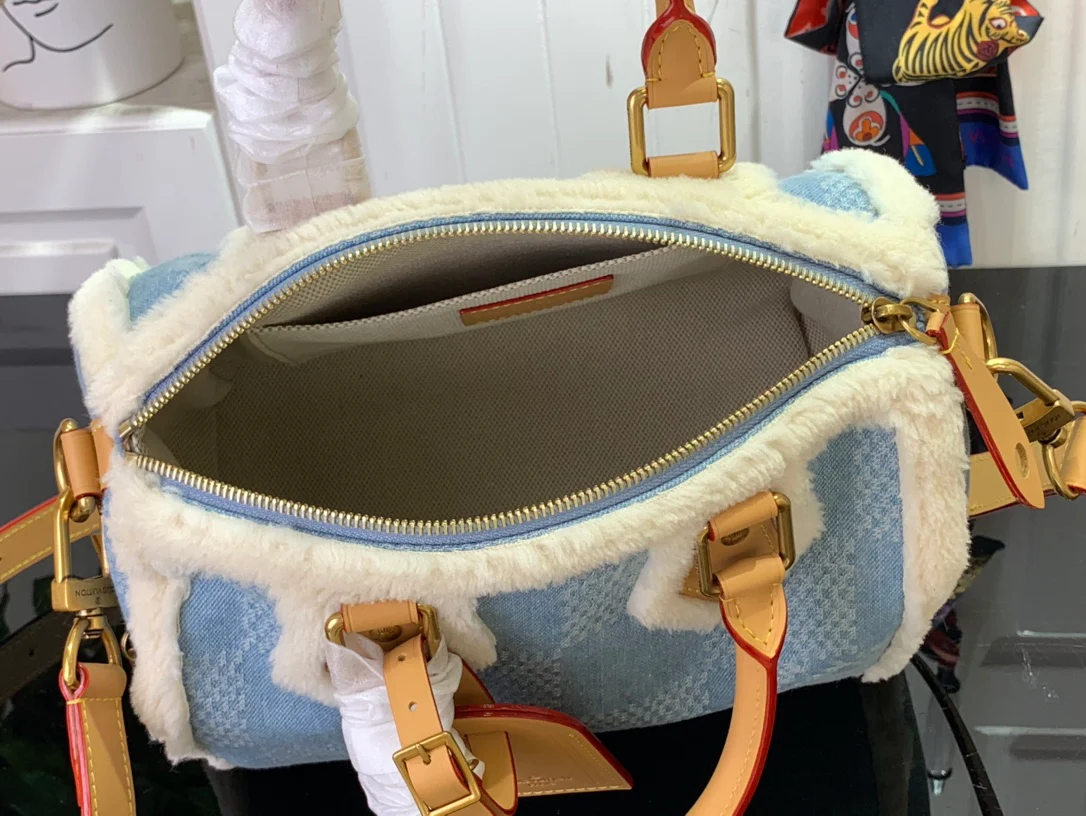 LV-n00111-speedy-25-bandouliere-blue