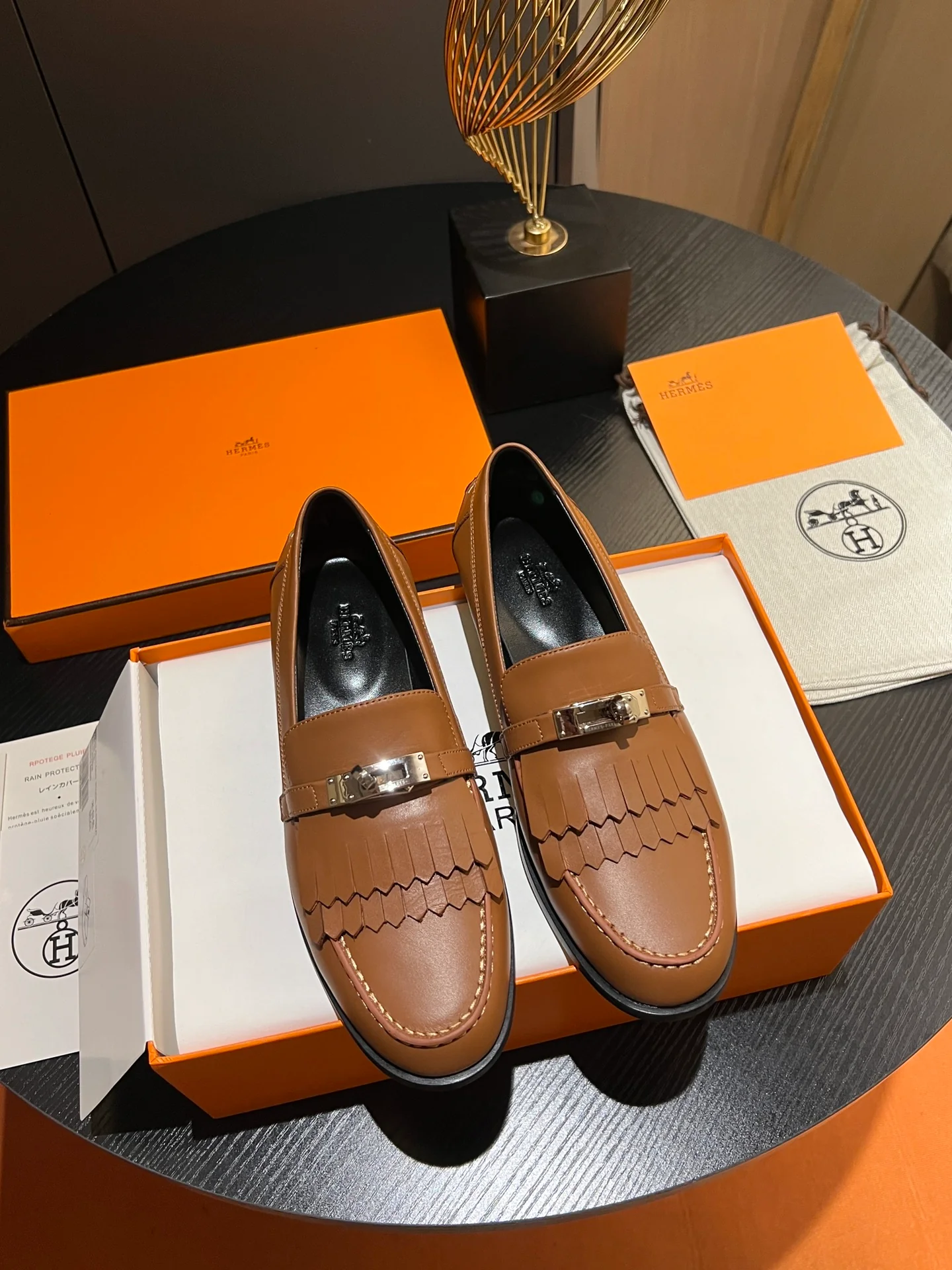 Лоферы Hermes 2024 с металлической пряжкой - коричневые