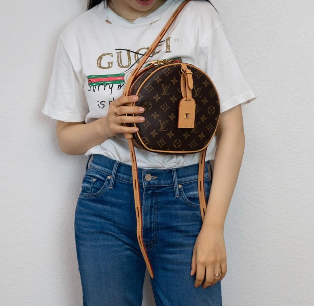 Круглая сумка LV