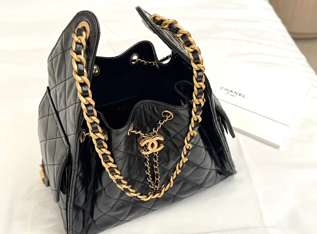 Сумка-ведро Chanel 25c 25bag из телячьей кожи с завязками, маленькая – черно-золотая