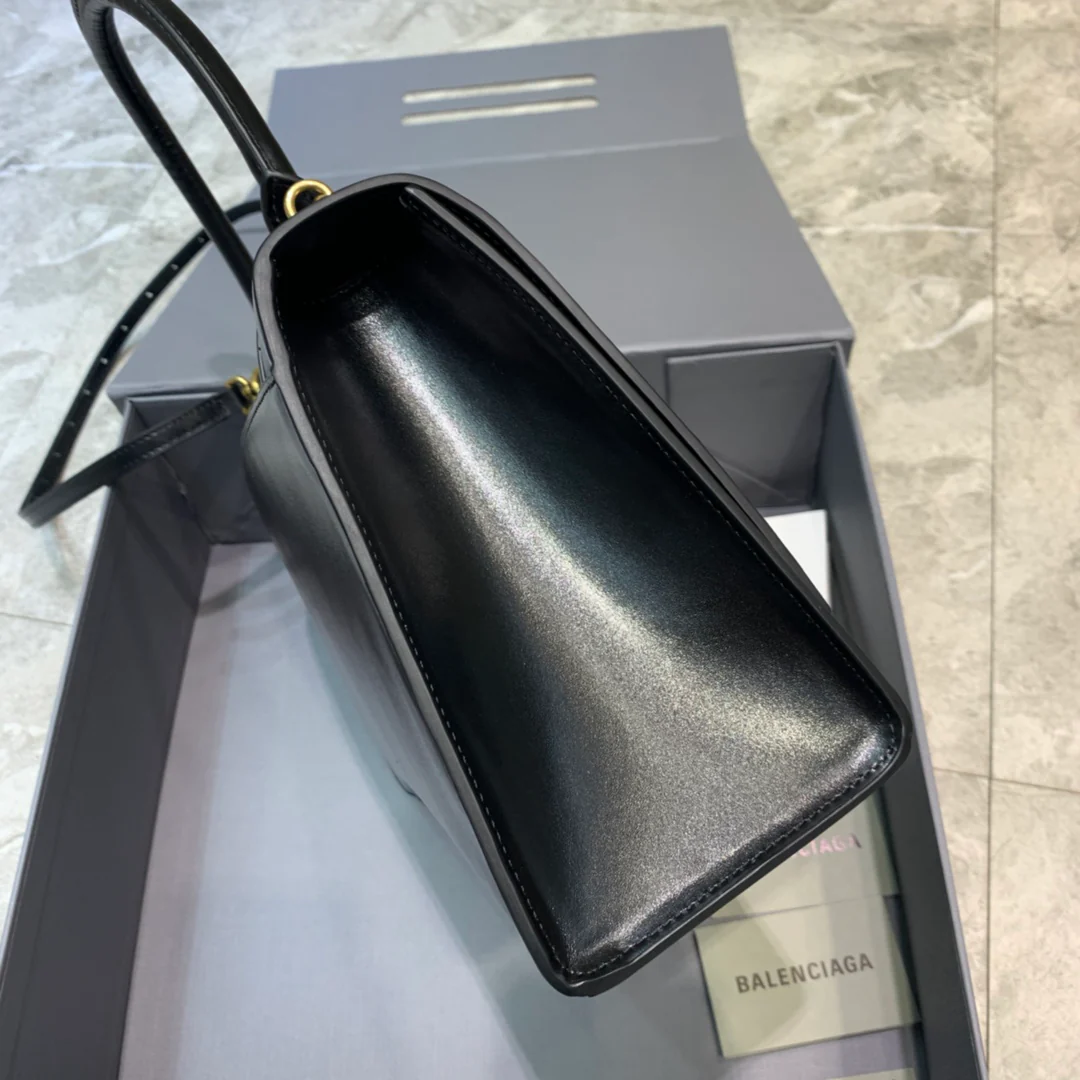 Сумка Balenciaga Hourglass (большая) - черная, однотонная кожа.