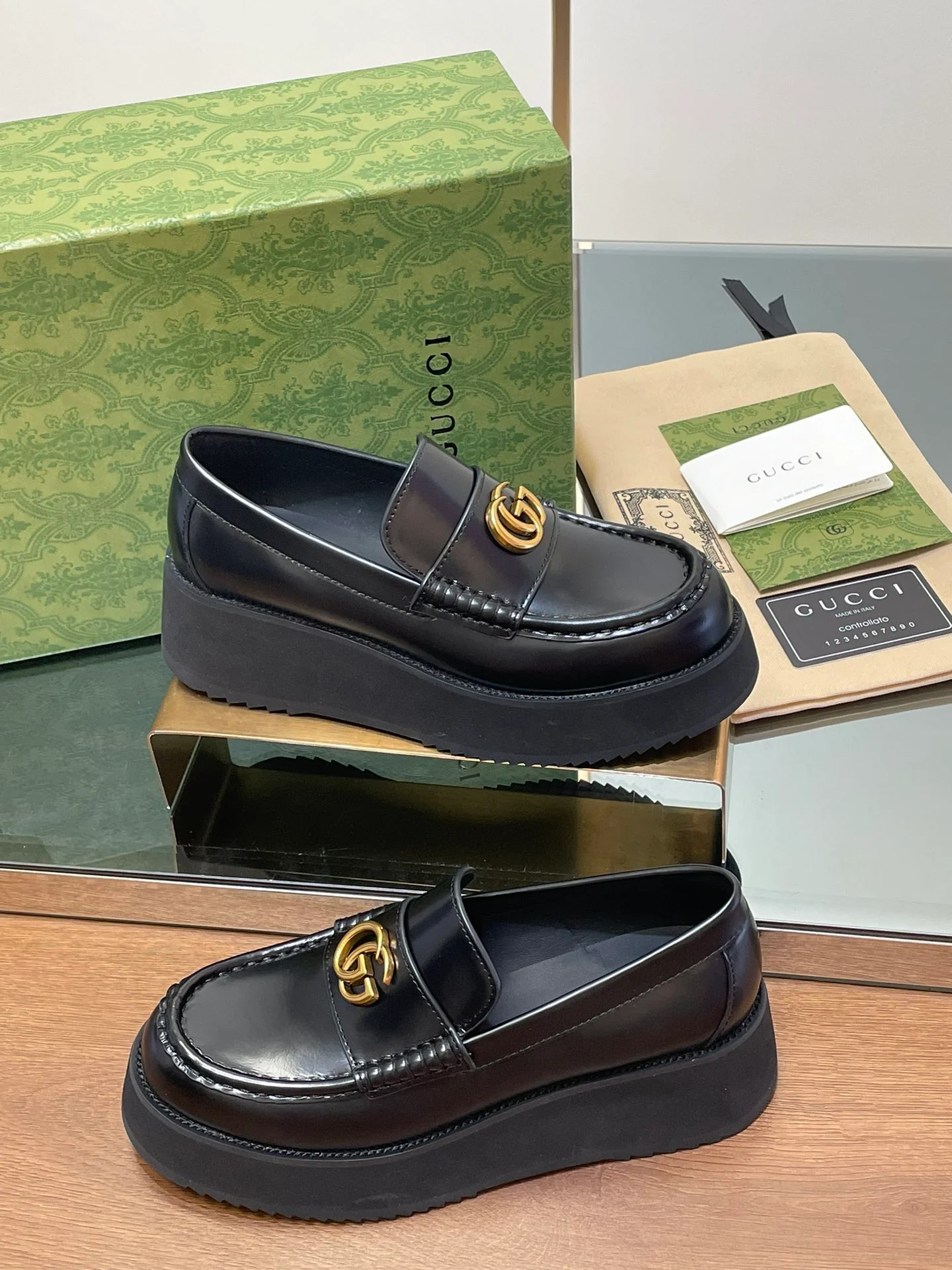 Лоферы на платформе Gucci 2024 - черные