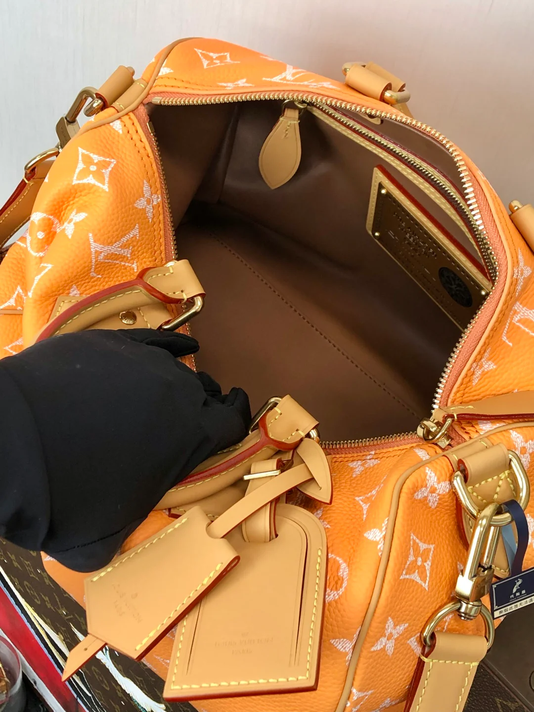 LV-m14064-speedy-p9-bandouliere-Creamy Orange