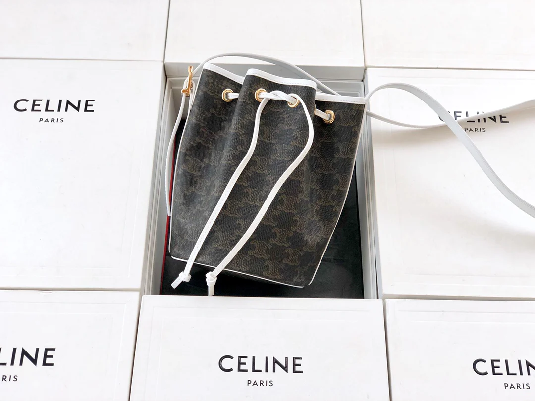 Маленькая холщовая сумка Celine Triomphe на завязках - белая, с монограммой.