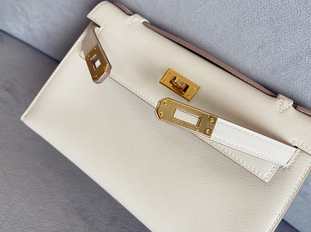 Сумка Hermes Mini Kelly 1-го поколения, 22 см, из кожи Swift, цвет Nutshade, фурнитура из белого золота.