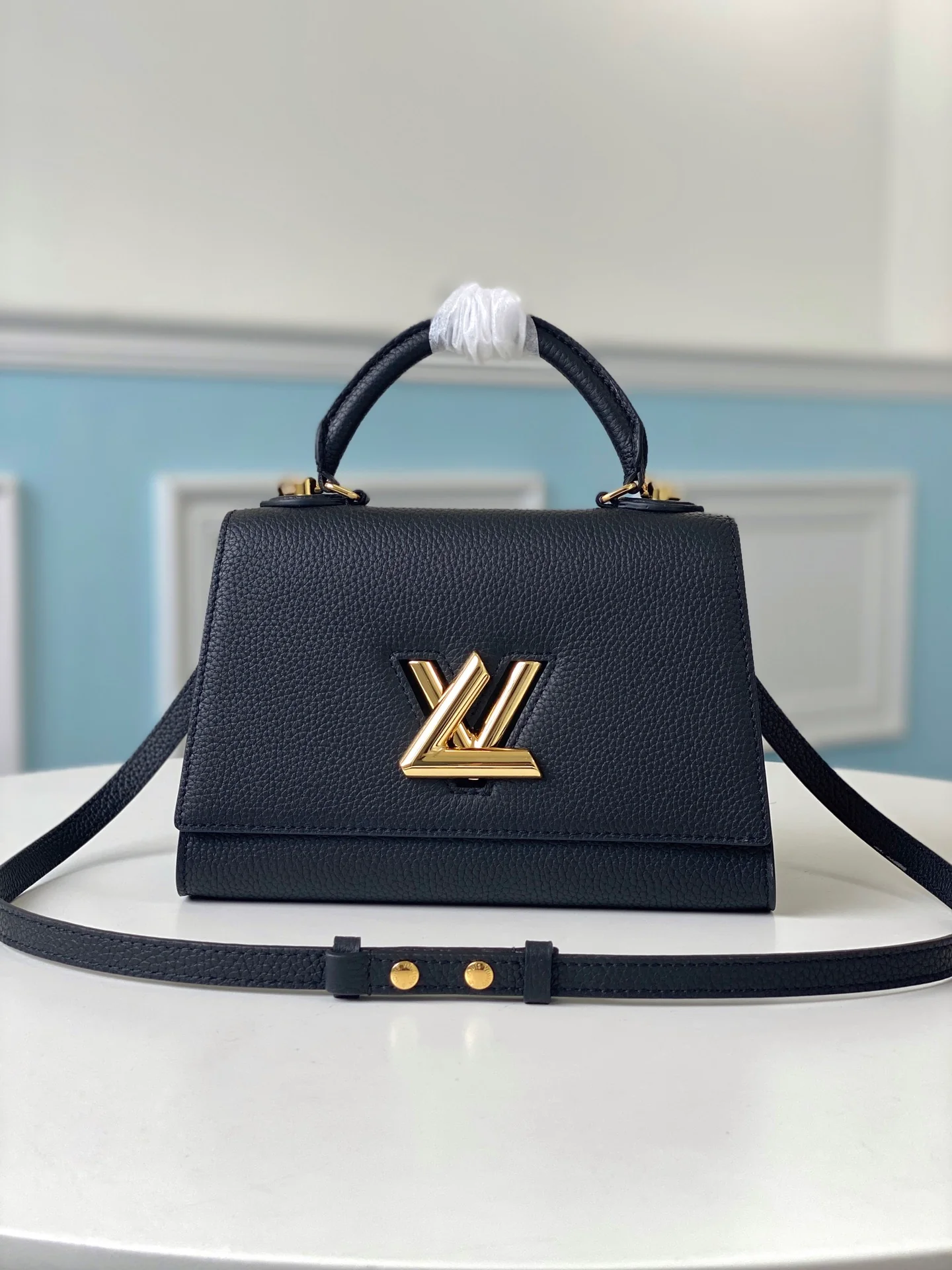 m57093-LV-twist-one-handle-small handbag-black