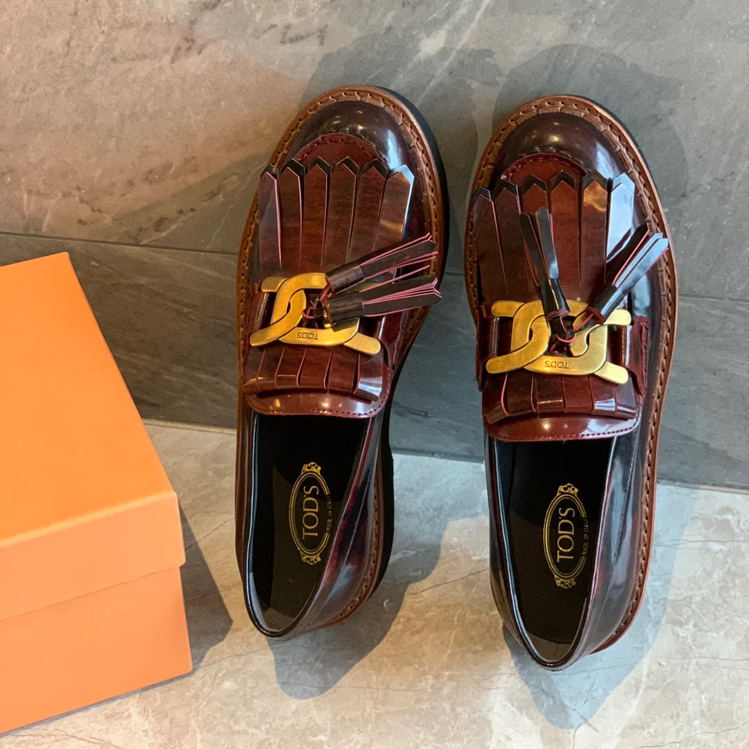 Лоферы Tods на платформе с кисточками - 1