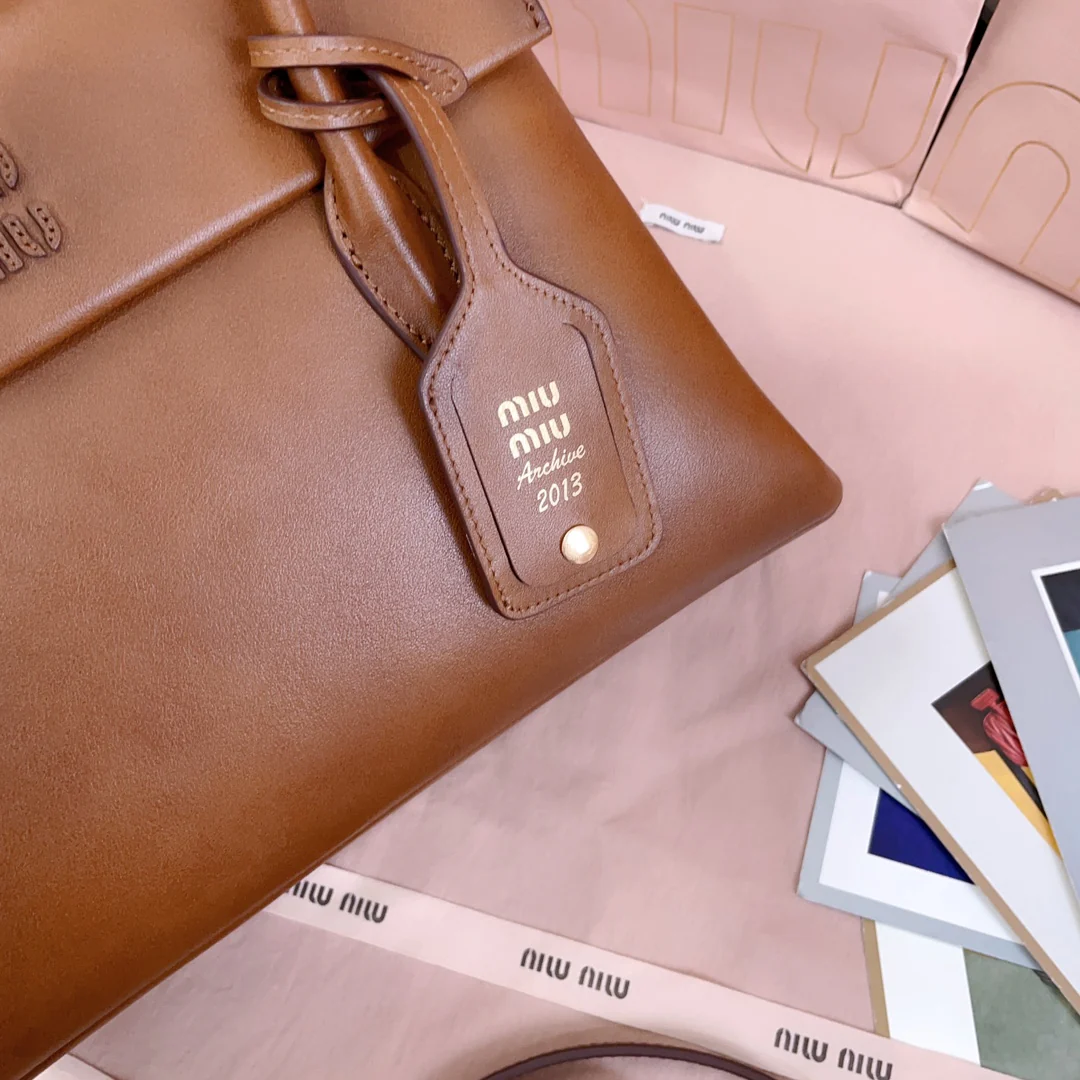 Сумка Miu Miu-5ba302-mimisolitaire из телячьей кожи