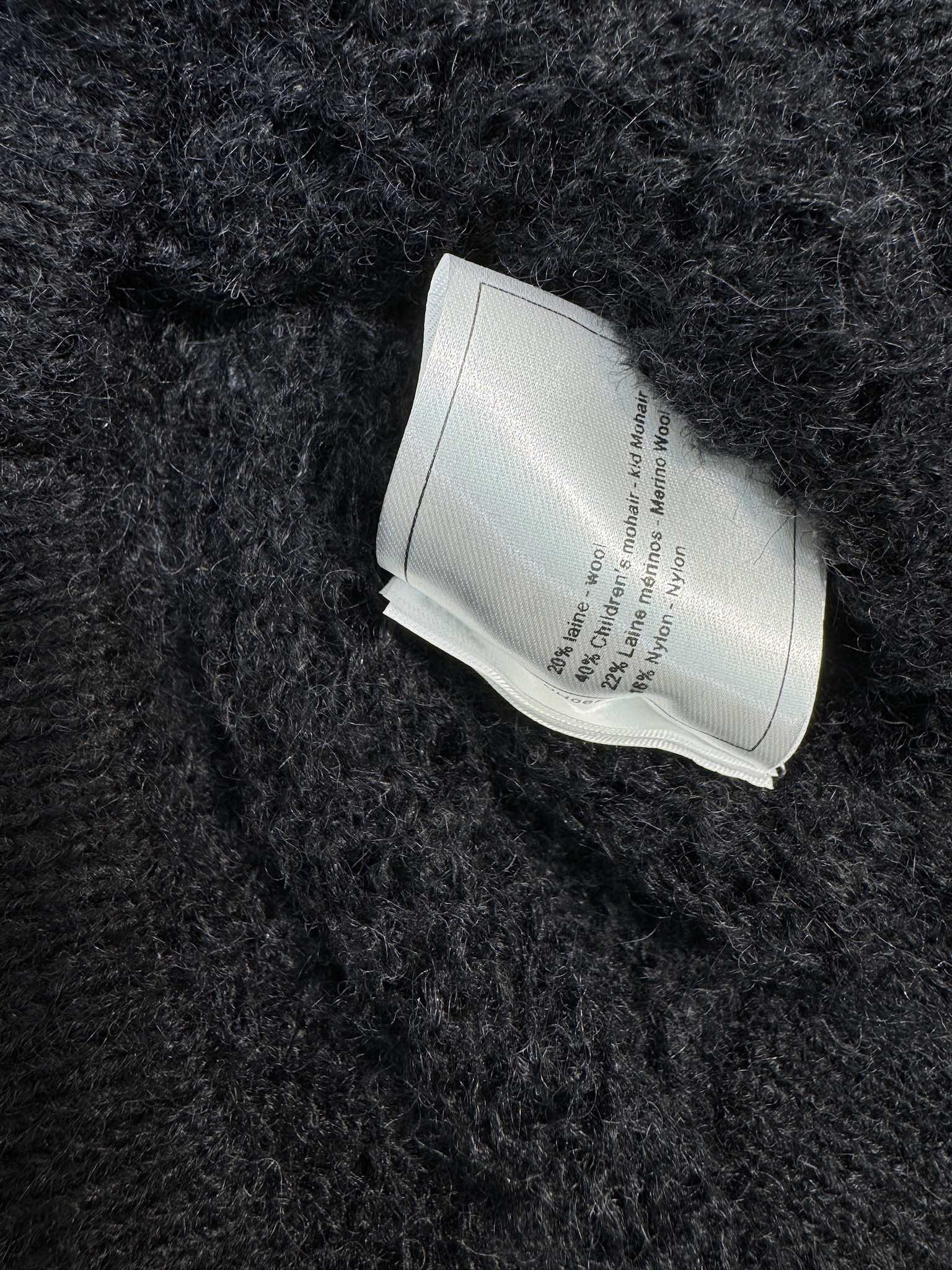 Chanel 2403-24 Новинка ранней весны: вязаный кардиган с короткими рукавами и ажурным узором ?фонарик? - черный