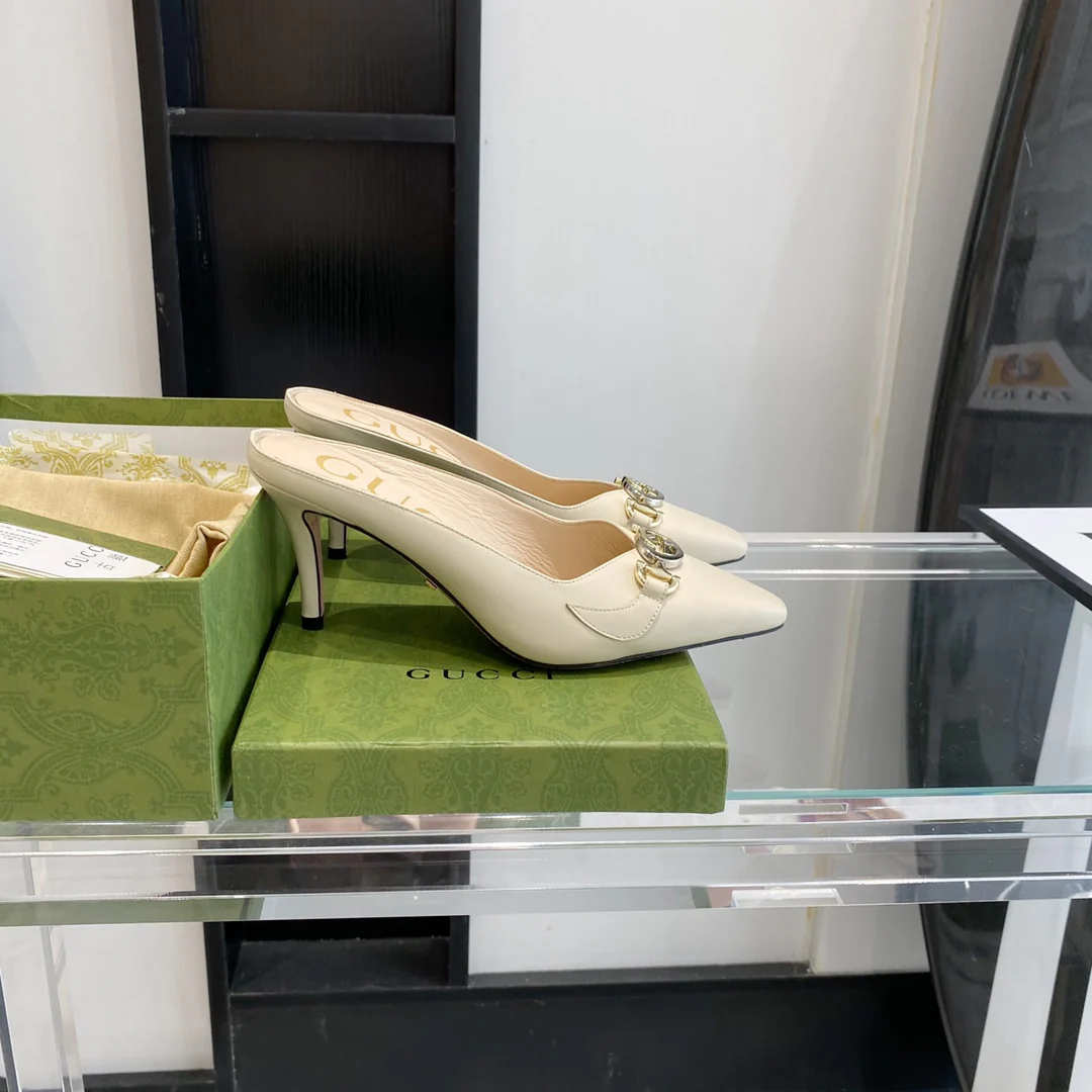 Мюли Gucci с острым носком на низком каблуке