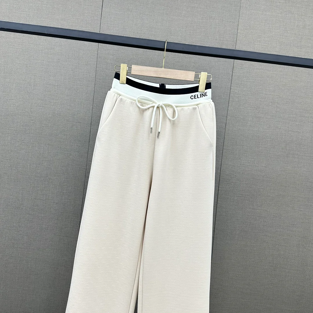 Удобные широкие брюки Celine 2403 с вышитым логотипом и шнуровкой — белые.