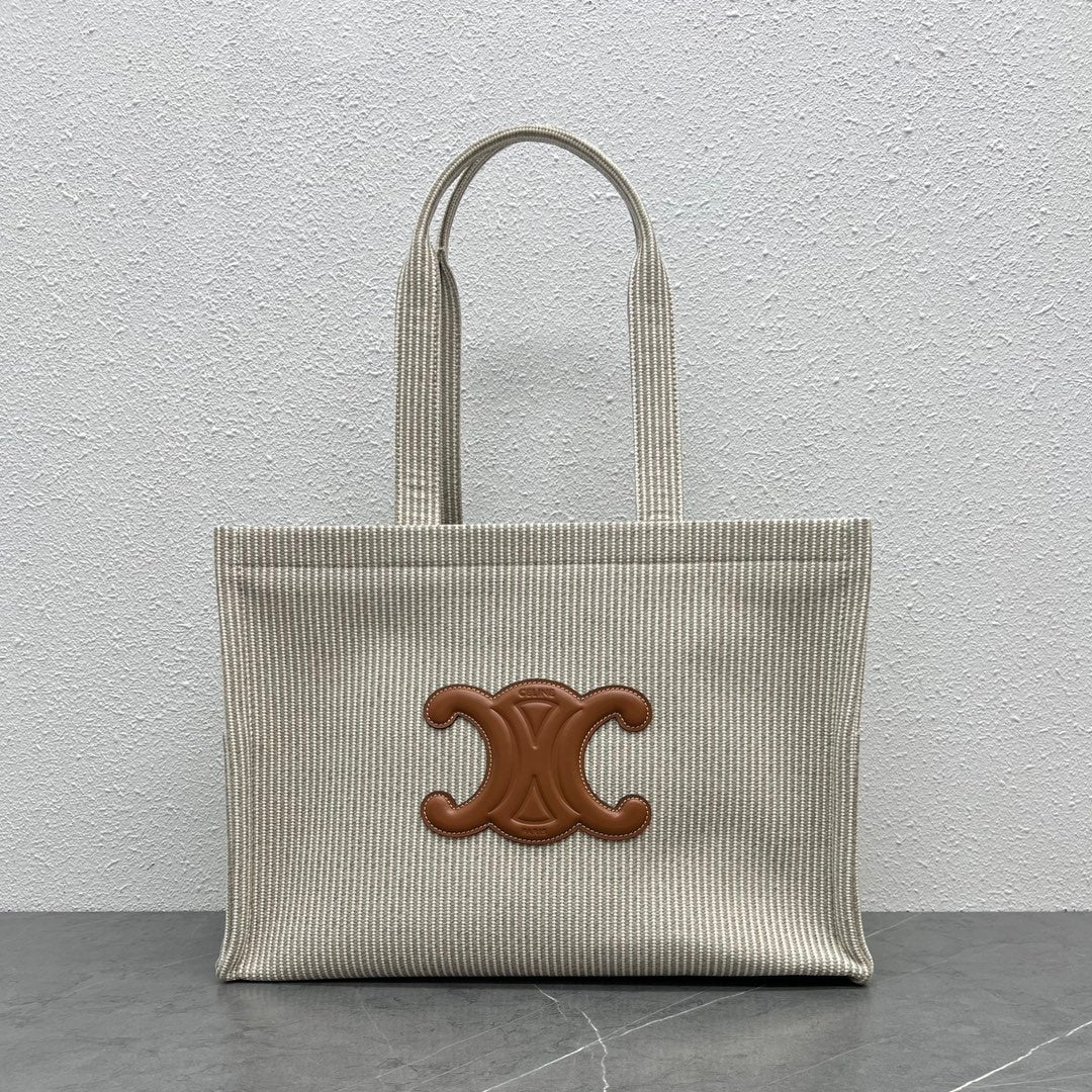 Новая полосатая холщовая сумка-тоут Cabas Thais от Celine — большой размер.