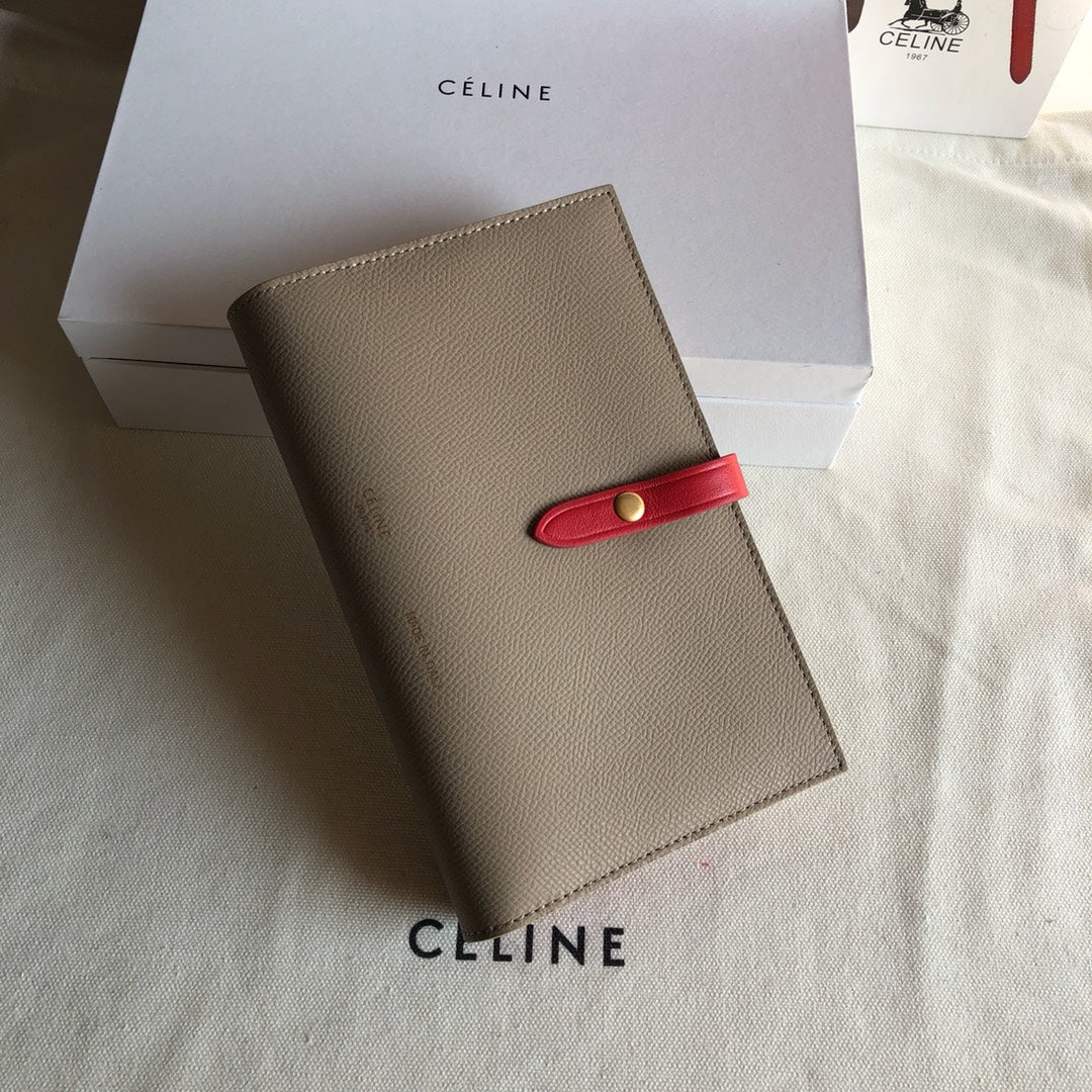 Длинный кошелек Celine — абрикосовый и фуксия — с принтом пальм.