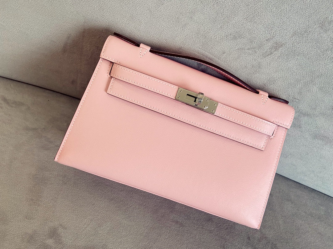 Мини-сумка Hermes Kelly 1-го поколения, 22 см, из кожи Swift, цвет Sakura Pink, серебряная пряжка.