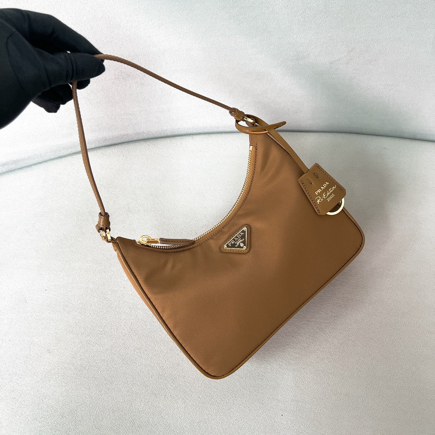 Сумка Prada 1N204M Re-Edition, коричневая.