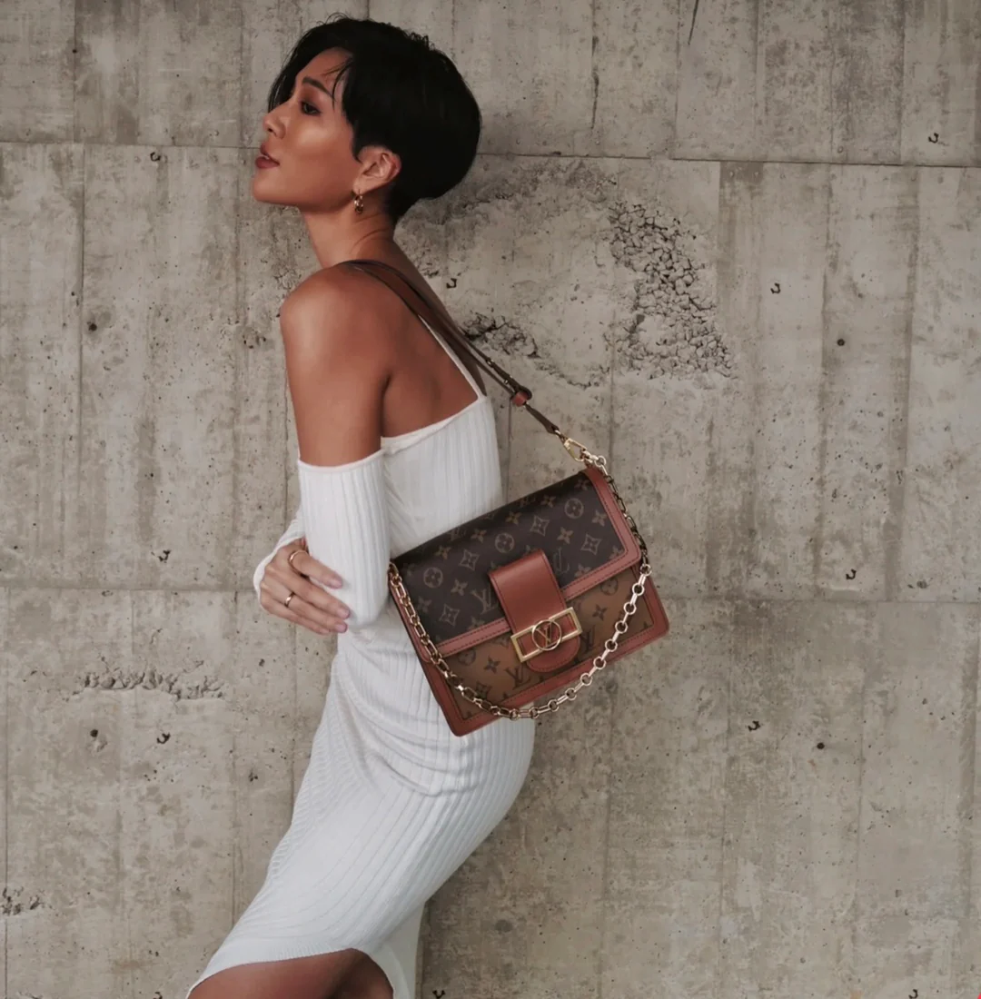 m44391-LV-dauphine-messenger bag-yellow flower-on-body photo