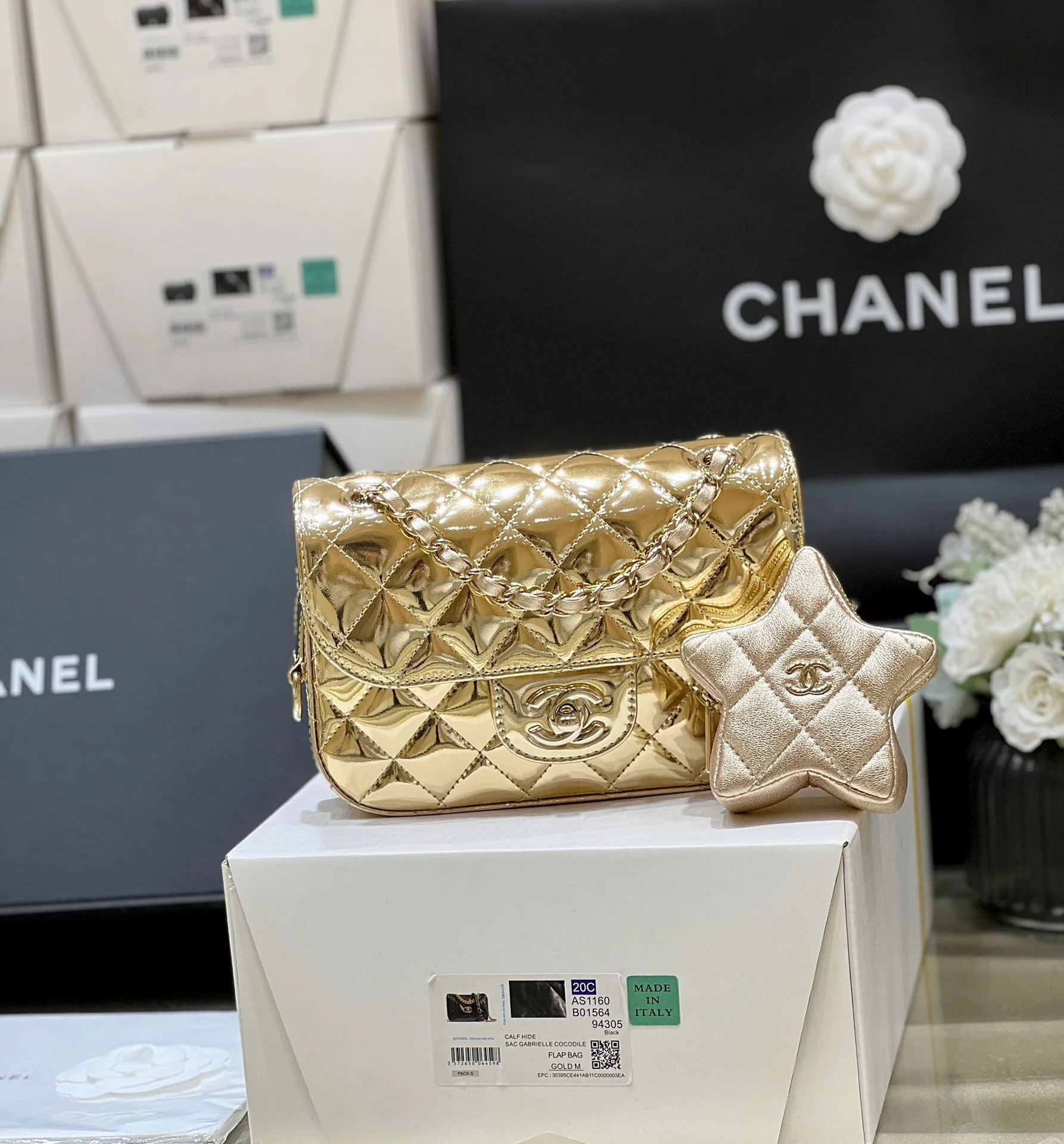 Весенняя коллекция Chanel 24c - Золотой кошелек для монет со звездным узором