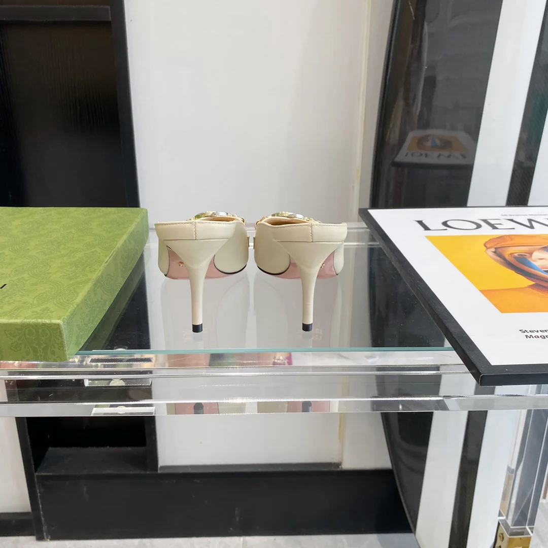 Мюли Gucci с острым носком на низком каблуке