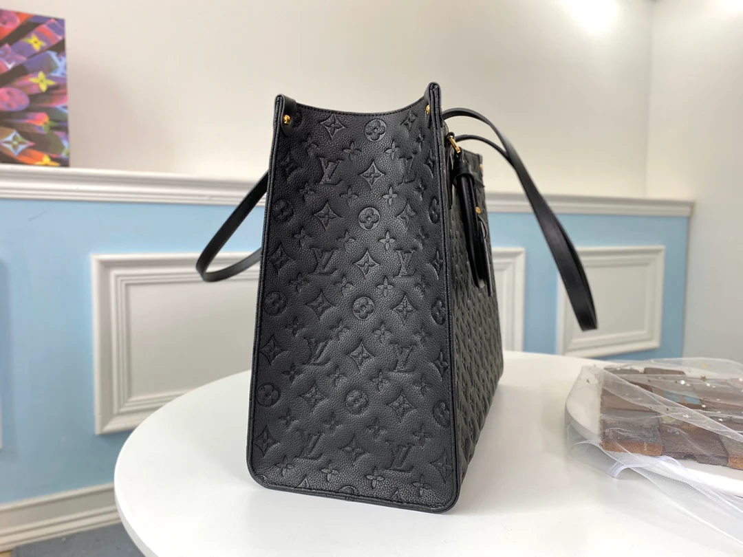 lv-m44925-black embossed-onthego-handbag
