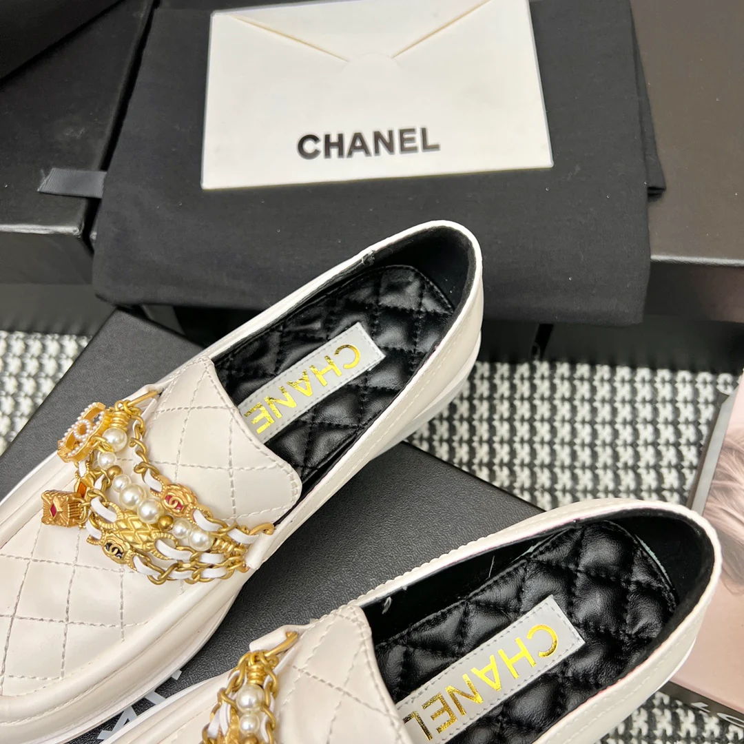 Туфли-балетки Chanel в афро-стиле