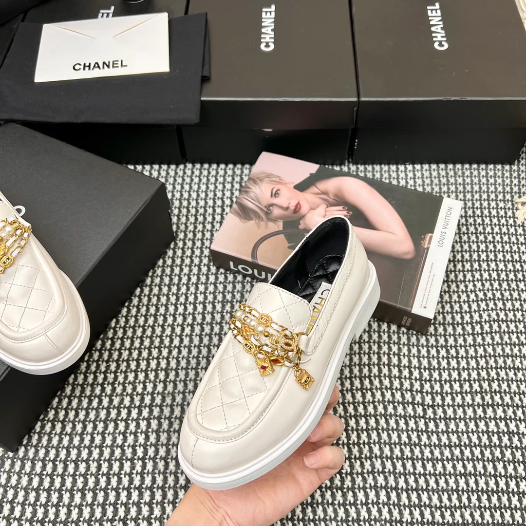 Туфли-балетки Chanel в афро-стиле