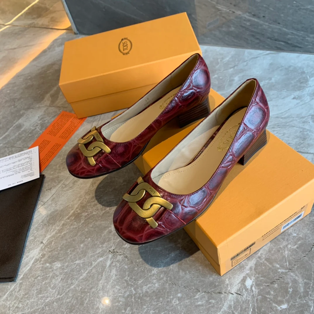 Туфли на низком каблуке Tods