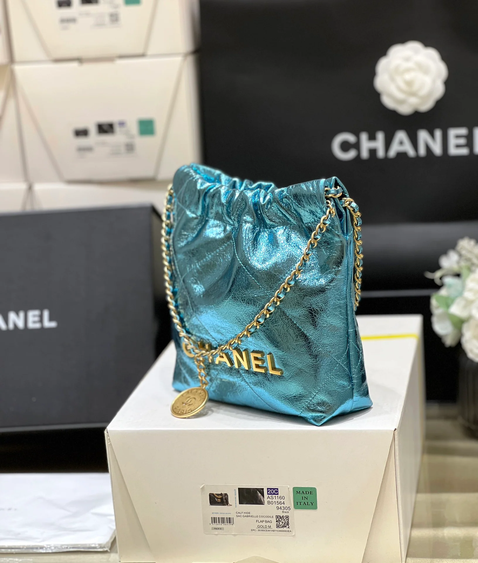 Миниатюрная металлическая кожаная мусорная сумка Chanel 25c - синяя