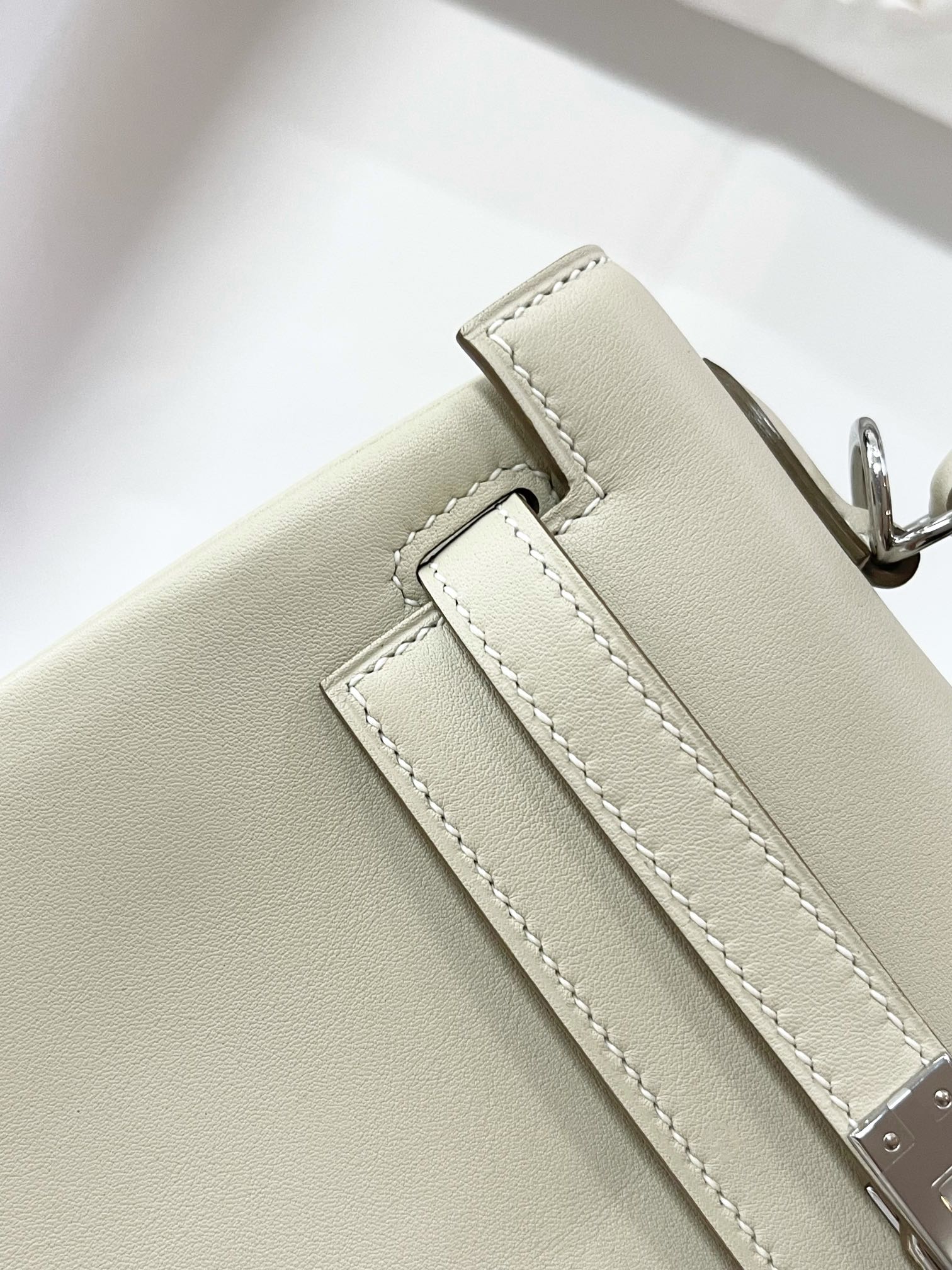 Hermes Kelly 25 Swift Milkshake White Silver Buckle